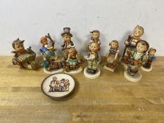 A collection of Hummel figures, tallest measures 15cm high, and a decorative plate (12)