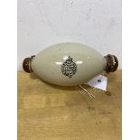 A late 19th early 20thc ceramic muff warmer inscribed The Queen's Muff Warmer measures 15cm