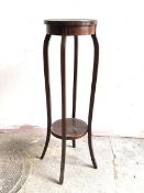 An Edwardian inlaid mahogany jardiniere stand, two tiers raised on square splayed supports, H99cm,