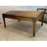 A Large Victorian mahogany double clerks desk, the sloped top with four hinged compartments, each