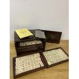 A 1920's / 30's early plastic tile mahjong set, drawers marked Chad Valley, measures 16cm x 23cm x