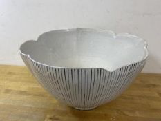 A mid 20thc Rye Pottery large bowl with black and white linear design with scalloped edge of