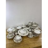A Royal Doulton larchmont dinner service including eight dinner plates measuring 27cm diameter, a