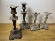 Two pairs of silver plated candlesticks, larger measures 26cm high