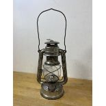 A German oil lantern inscribed Western Germany Baby Feuer Hand, glass marked Jena Glass, measures