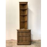 Ercol, A stained elm corner cabinet, with three open shelves over cupboard to base, H196cm, W68cm,