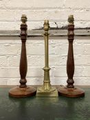 A Pair of 20th century turned ash table lights (H41cm) together with a cast brass table light (
