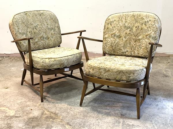 Ercol, A pair of stained beech framed model 203 easy chairs, H77cm, W70cm, D70cm