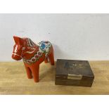 A Nils Olsson Swedish painted horse measures 20cm high along with a Scandinavian box (2)