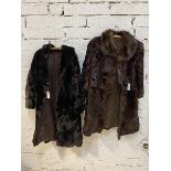 A fur coat measures 34cm across shoulders x 105cm, single pocket to interior and another coat