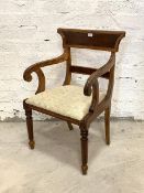 A 19th century walnut elbow chair, with reeded scrolled open arms, drop in upholstered seat pad,