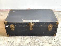 An early to mid 20th century steamer trunk, with leather carry handle to each end, H34cm, W93cm,