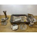A mixed lot of Epns including two pepperettes, ashtrays, flower tube, serving dish and cover lacking