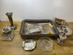A mixed lot of Epns including two pepperettes, ashtrays, flower tube, serving dish and cover lacking