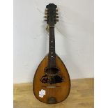 An early 20thc strung instrument with inlay decoration measures 61cm