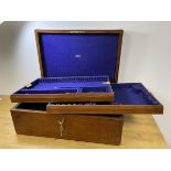 An Edwardian mahogany cutlery canteen with two fitted trays inscribed to interior Sidney Latimer