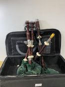 A complete set of bagpipes with canmore bag comes with bottle trap and set of drone reeds also