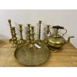 A collection of brassware including a tray with middle eastern decoration, measures 32cm diameter,