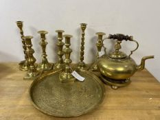 A collection of brassware including a tray with middle eastern decoration, measures 32cm diameter,