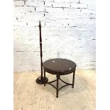 A Regency style mahogany lamp table, the circular top on reeded supports with bowed stretchers (