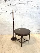 A Regency style mahogany lamp table, the circular top on reeded supports with bowed stretchers (
