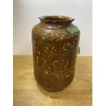 An 18thc slip ware jar inscribed E S 1757, partially glazed, chips, losses and repairs, measures
