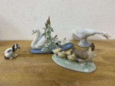 A collection of Lladro animals including a swan with cygnets, measures 12cm high a/f, also a