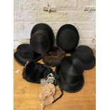 A collection of hats including top hat, bowlers, fur hat, also a collection of bow ties, clip on bow