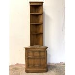 Ercol, A stained elm corner cabinet, with three open shelves over cupboard to base, H196cm, W68cm,