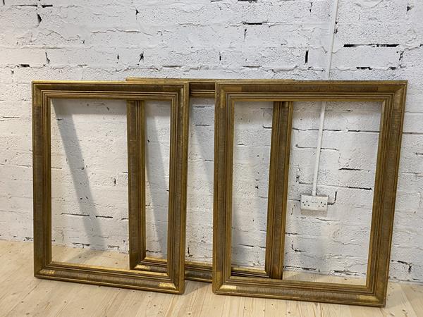 A set of three moulded gilt frames internal measurement 102cm x 76cm (3)