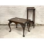 A George II style mahogany low table, with serpentine top over shell carved cabriole supports (