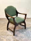 An early to mid 20th century Bishops type 'X' frame chair, having stained beech frame and