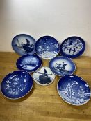 A collection of four decorative Royal Copenhagen plates including Christmas ones, three B & G