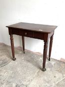 A Victorian walnut side table, the rectangular top over single frieze drawer, raised on turned