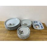 A collection of Buchan stoneware plates with thistle decoration including dinner plates (7) of