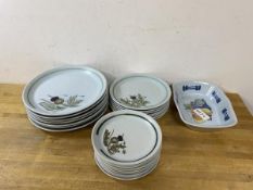 A collection of Buchan stoneware plates with thistle decoration including dinner plates (7) of