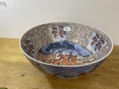 A modern Chinese reproduction porcelain hunting style bowl decorated with hounds and horseman,