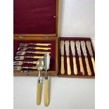 An early 20thc cutlery canteen with a set of six knives and forks with bone handles, also an