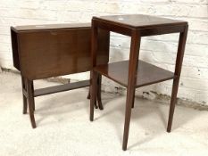 An Edwardian inlaid mahogany Sutherland table, the drop leaves with canted corners raised on