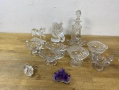 A collection of glass ware including salts, also a scent bottle and cut crystal figures and an