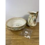 A late 19th early 20thc Crown Devon wash basin and ewer, basin a/f, ewer measures 32cm high (2)