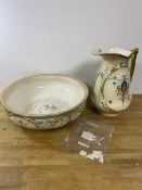 A late 19th early 20thc Crown Devon wash basin and ewer, basin a/f, ewer measures 32cm high (2)