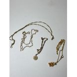 A quantity of gold chains including a 9ct gold chain with pendant having initials JC, two other