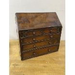 A 19thc apprentice piece mahogany fall front bureau with two short drawers over three graduated