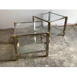 Peirre Vandel, A pair of contemporary brass, chrome and glass two tier lamp tables, H50cm, W58cm.