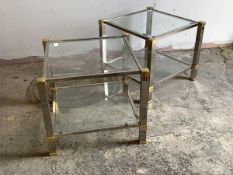 Peirre Vandel, A pair of contemporary brass, chrome and glass two tier lamp tables, H50cm, W58cm.