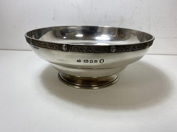 A 1935 London silver footed bowl, makers mark AS, celtic knot decoration to rim, measures 8cm x 19cm