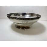 A 1935 London silver footed bowl, makers mark AS, celtic knot decoration to rim, measures 8cm x 19cm