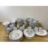 A Denby part dinner service including eight dinner plates, measure 25.5 cm diameter, eight side