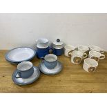 A pair of Denby coffee cups and saucers, cups measure 7cm high along with two matching bowls,